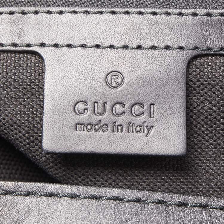 مملوكة مسبقًا Gucci Black Floral Print Suede Stirrup Tote