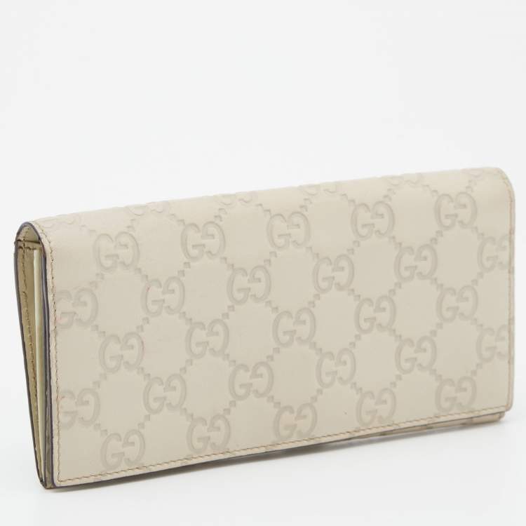 مملوكة مسبقًا Gucci Cream Guccissima Leather Flap Continental Wallet