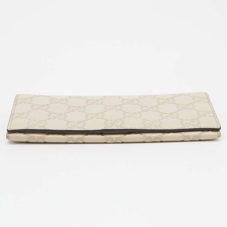 مملوكة مسبقًا Gucci Cream Guccissima Leather Flap Continental Wallet