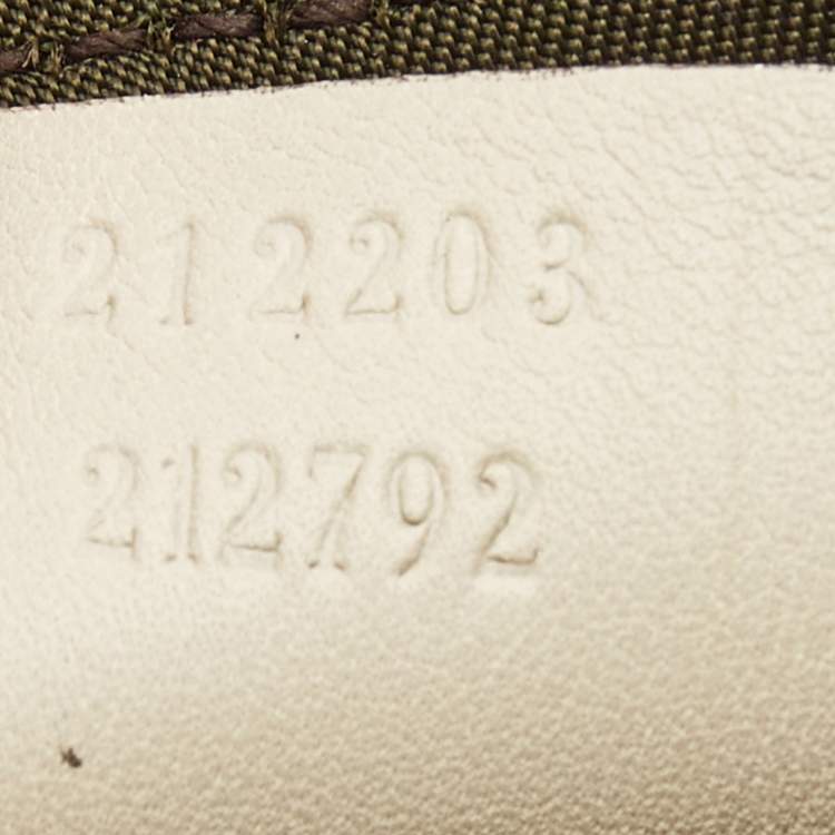 مملوكة مسبقًا Gucci Off-White Guccissima Leather Interlocking G Wristlet Clutch