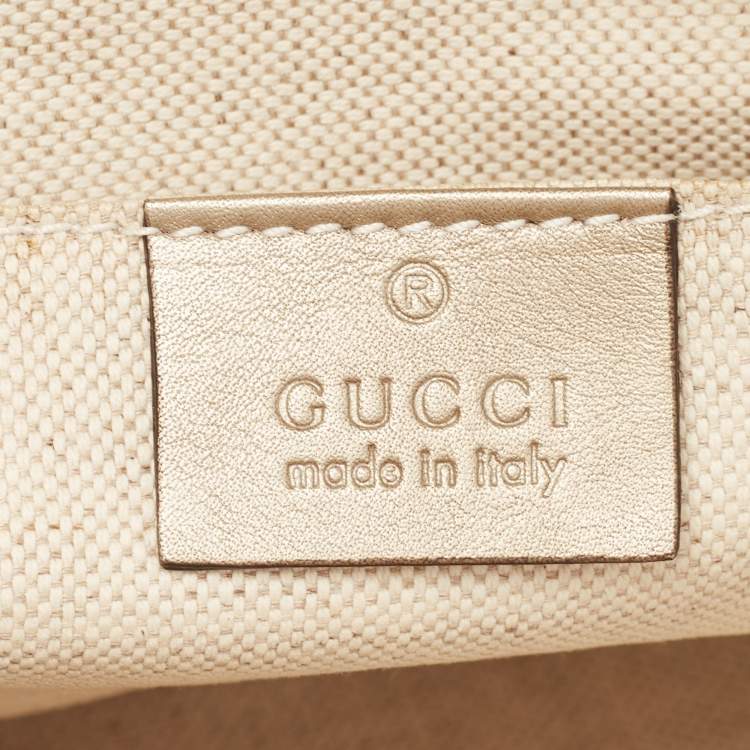 مملوكة مسبقًا Gucci Gold Micro Guccissima Leather Tassel Zip Clutch