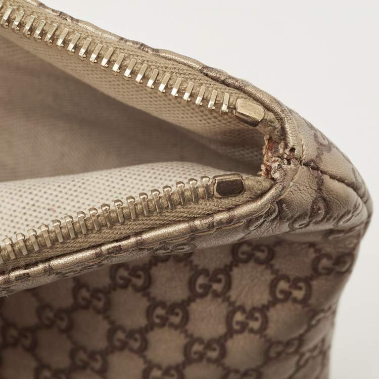 مملوكة مسبقًا Gucci Gold Micro Guccissima Leather Tassel Zip Clutch