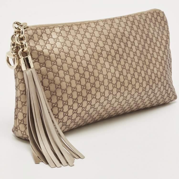 مملوكة مسبقًا Gucci Gold Micro Guccissima Leather Tassel Zip Clutch