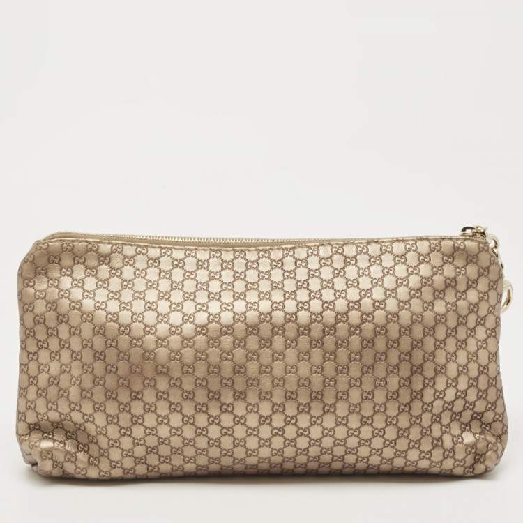 مملوكة مسبقًا Gucci Gold Micro Guccissima Leather Tassel Zip Clutch