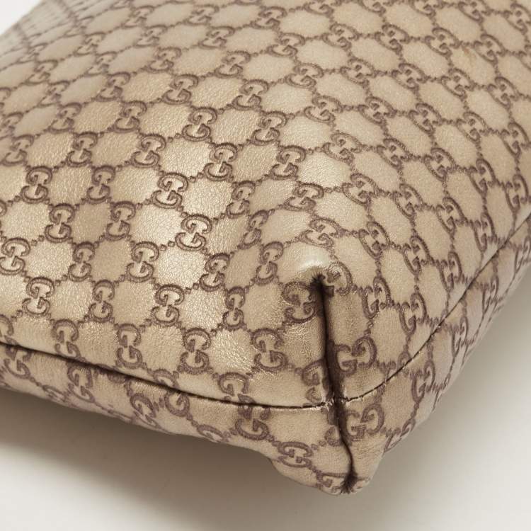 مملوكة مسبقًا Gucci Gold Micro Guccissima Leather Tassel Zip Clutch