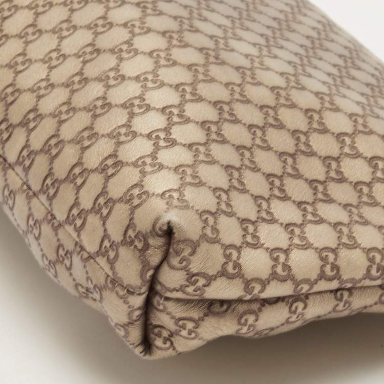 مملوكة مسبقًا Gucci Gold Micro Guccissima Leather Tassel Zip Clutch