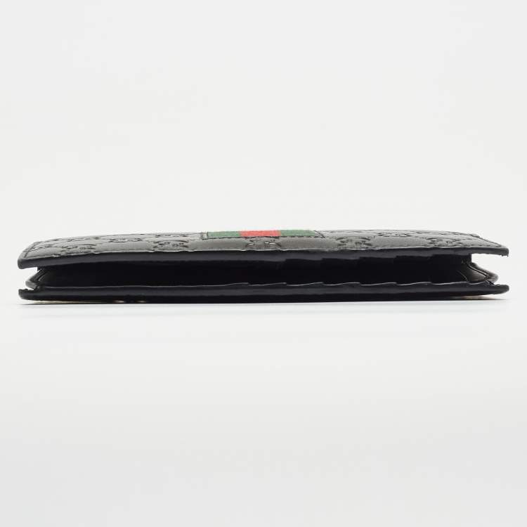 مملوكة مسب�قًا Gucci Black Guccissima Leather Web Vertical Wallet