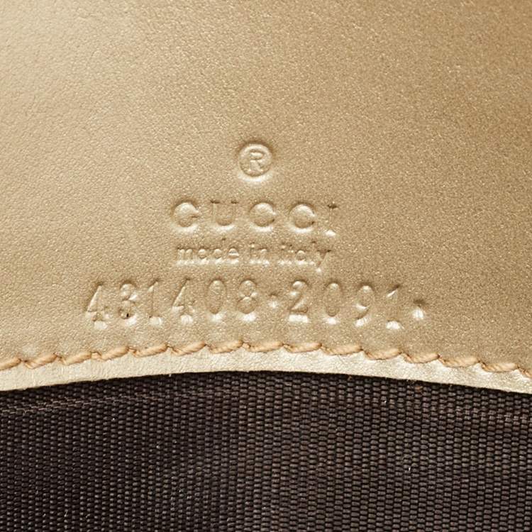 Pre Owned Gucci Gold Guccissima Leather Bow Wallet On Chain