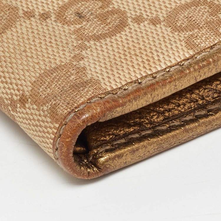 Pre Owned Gucci Beige/Gold GG Canvas and Leather Princy Trifold Wallet