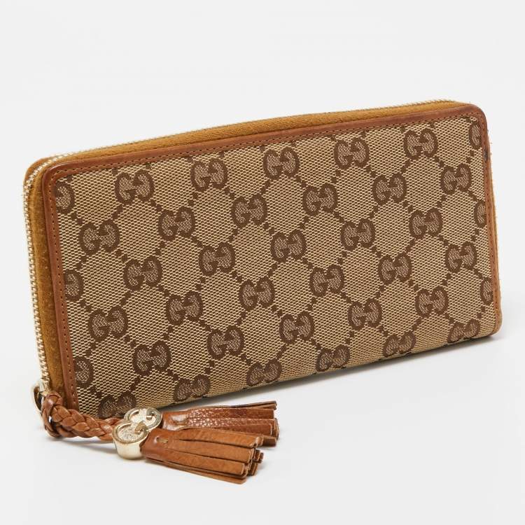 مملوكة مسبقًا Gucci Beige GG Canvas and Leather Tassel Zip Around Wallet