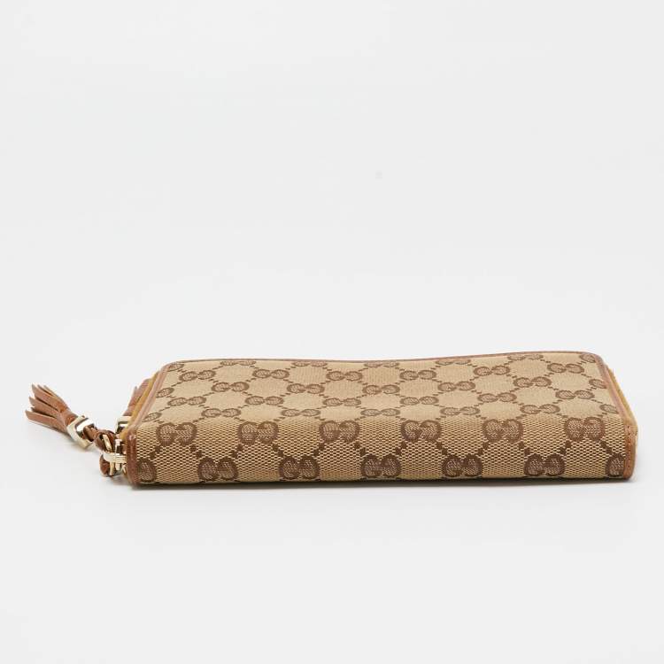 مملوكة مسبقًا Gucci Beige GG Canvas and Leather Tassel Zip Around Wallet