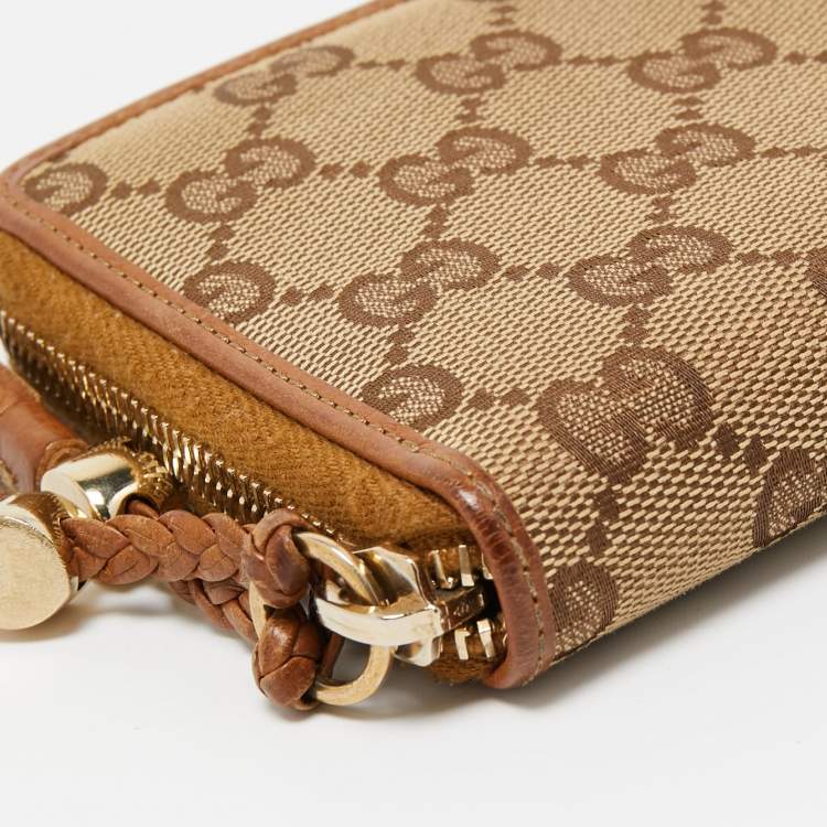 مملوكة مسبقًا Gucci Beige GG Canvas and Leather Tassel Zip Around Wallet
