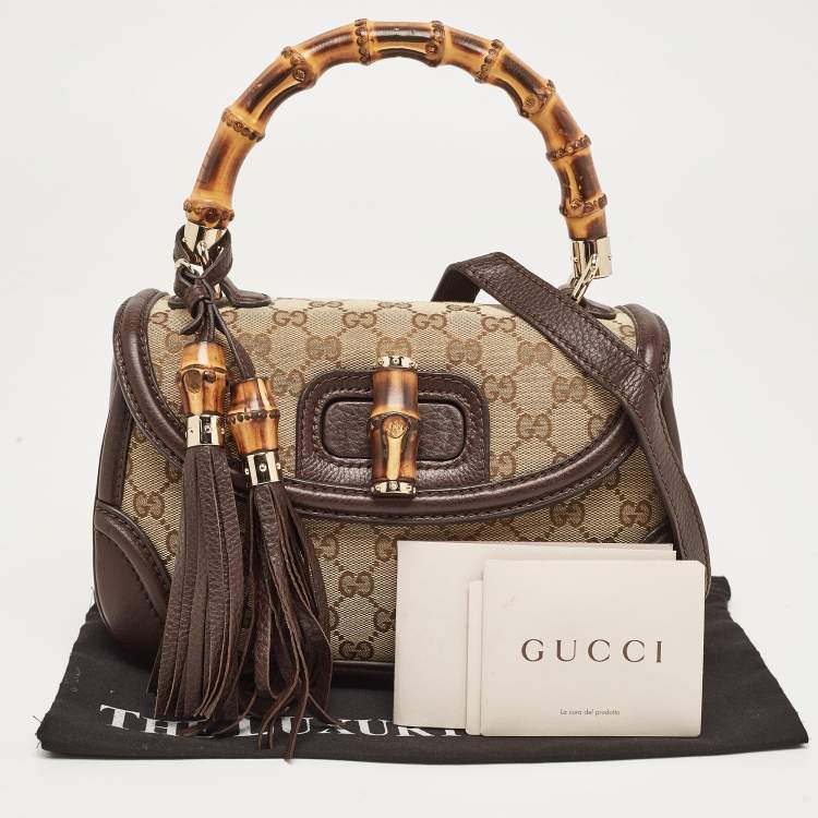 Pre Owned Gucci Beige/Brown GG Canvas and Leather Tassel New Bamboo Top Handle Bag