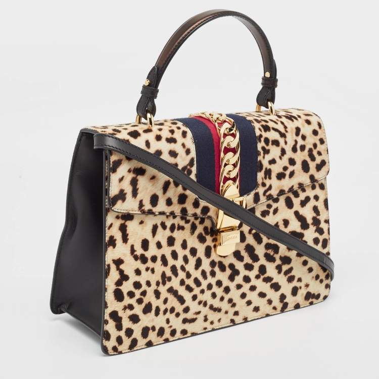 Pre Owned Gucci Beige/Black Leopard Print Calfhair and Leather Medium Sylvie Top Handle Bag