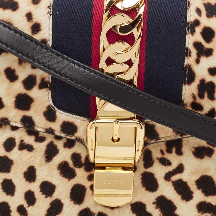 Pre Owned Gucci Beige/Black Leopard Print Calfhair and Leather Medium Sylvie Top Handle Bag