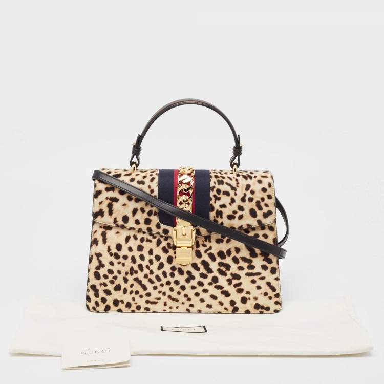 Pre Owned Gucci Beige/Black Leopard Print Calfhair and Leather Medium Sylvie Top Handle Bag
