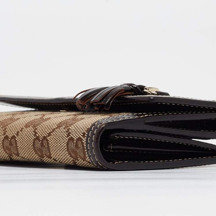 Pre Owned Gucci Beige/Brown GG Canvas and Leather Horsebit Tassel Continental Wallet