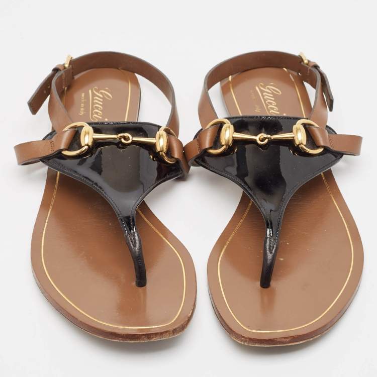 مملوكة مسبقًا Gucci Black/Brown Patent and Leather Horsebit Thong Flat Sandals Size 38.5