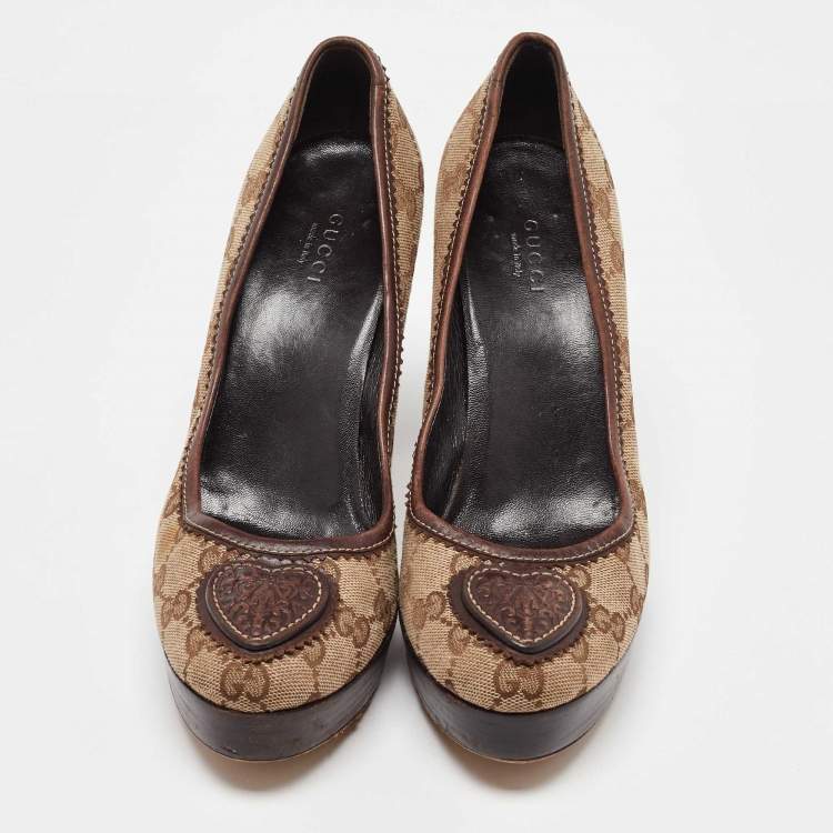 Pre Owned Gucci Beige/Brown GG Canvas and Leather Platform Pumps Size 38.5