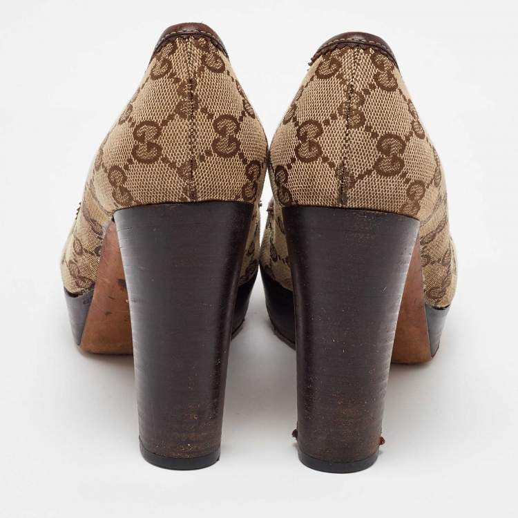 Pre Owned Gucci Beige/Brown GG Canvas and Leather Platform Pumps Size 38.5