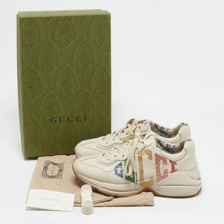 Pre Owned Gucci Cream Leather Glitter Logo Rhyton Sneakers Size 37.5