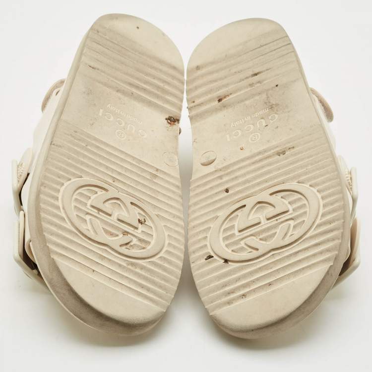 Pre Owned Gucci Off White Rubber Double G Logo Dusty Ankle Strap Flat Sandals Size 36