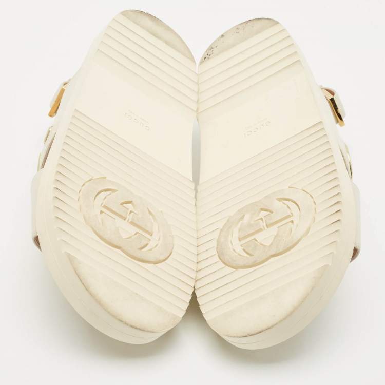 Pre Owned Gucci Off White Leather Logo Ankle Strap Flat Sandals 38.5