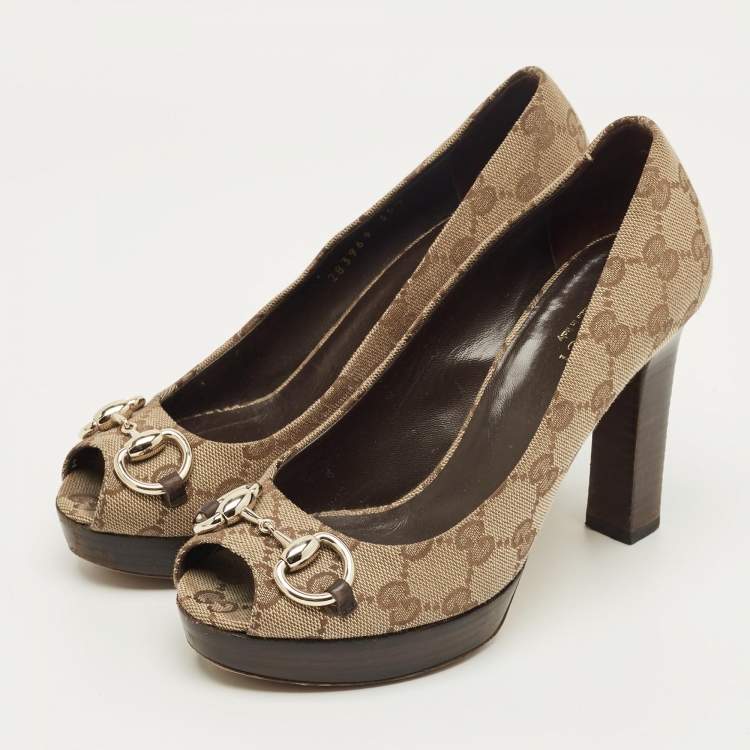 Pre Owned Gucci Beige/Brown GG Canvas and Leather Horsebit Platform Pumps Size 35.5