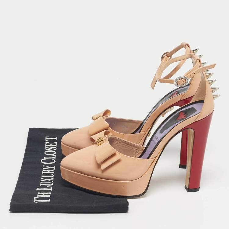 Pre Owned Gucci Beige Patent Leather Sadie Bow Spike Platform Pumps Size 36