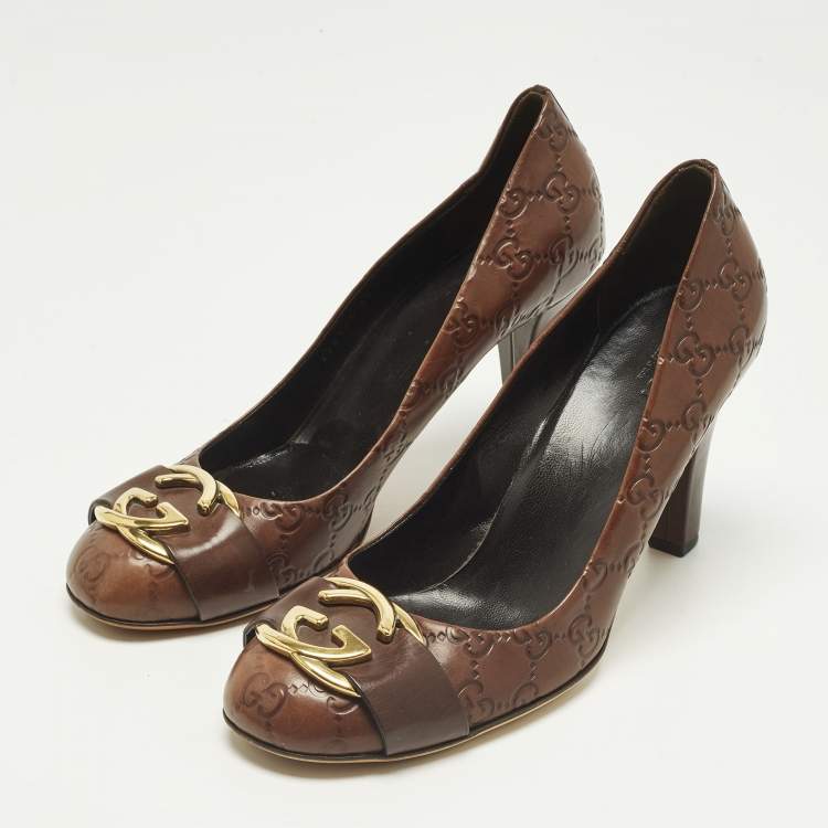 Pre Owned Gucci Brown GG Leather Interlocking Logo Round Toe Pumps Size 39.5