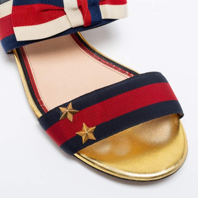 مملوكة مسبقًا Gucci Red/Navy Blue Leather and Canvas Web Flat Slingback Sandals Size 37.5