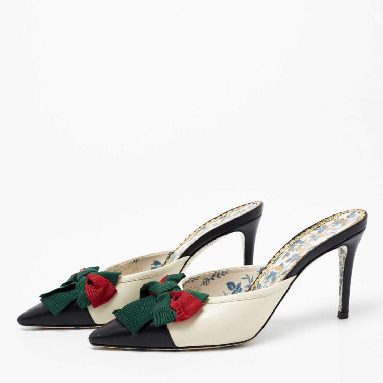 Gucci store bow mules