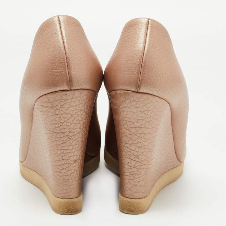 Pre Owned Gucci Metallic Pink Leather Horsebit Peep Toe Wedge Pumps Size 38.5