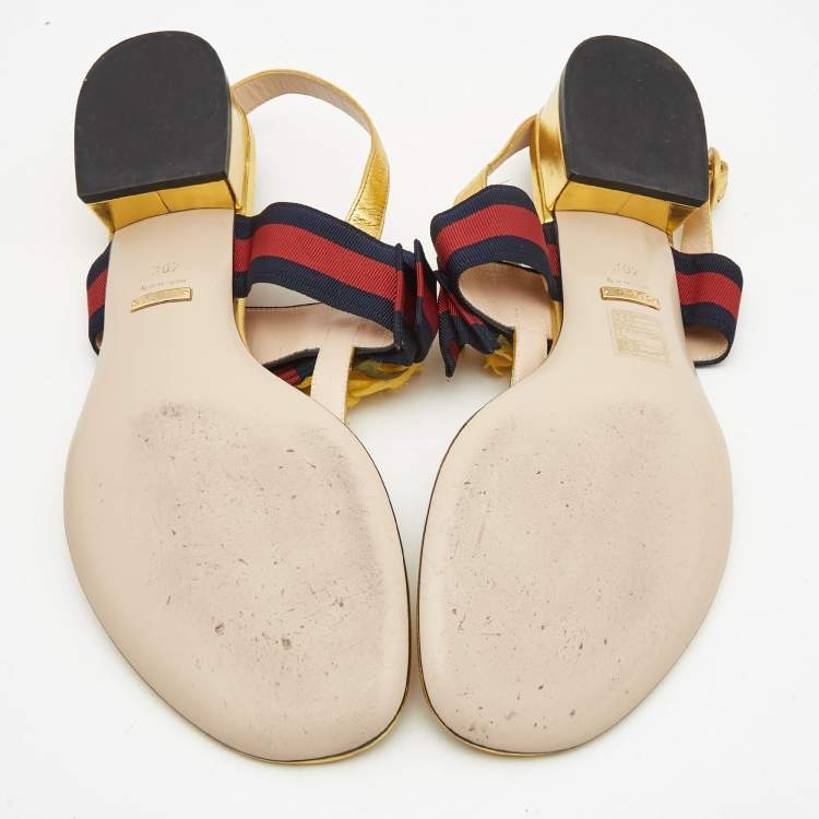 مملوكة مسبقًا Gucci Gold Foil Leather Web Bow Thong Slingback Flat Sandals Size 40.5