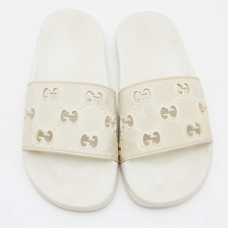 Pre Owned Gucci White GG Laser Cut Rubber Slides Size 38