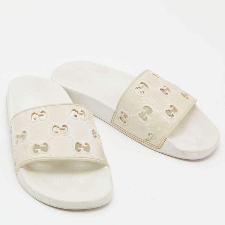 Pre Owned Gucci White GG Laser Cut Rubber Slides Size 38