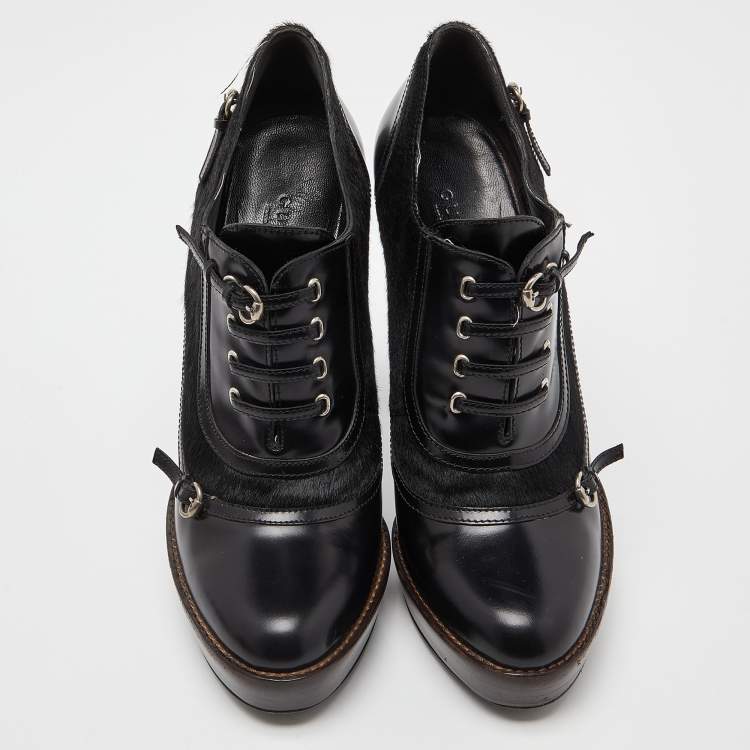Pre Owned Gucci Black Leather and Calf Hair Buckle Detail Platform Ankle Booties Size 38.5