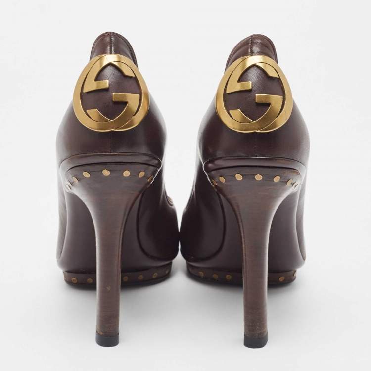 Pre Owned Gucci Brown Leather Interlocking G Studded Platform Pumps Size 42