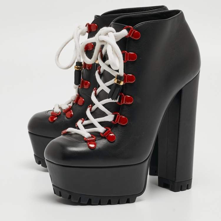 Gucci black hotsell boots red laces