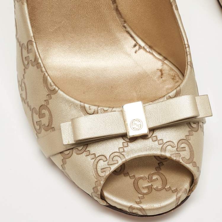 مملوكة مسبقًا Gucci Gold Guccissima Leather Bow Detail Peep Toe Pumps Size 40