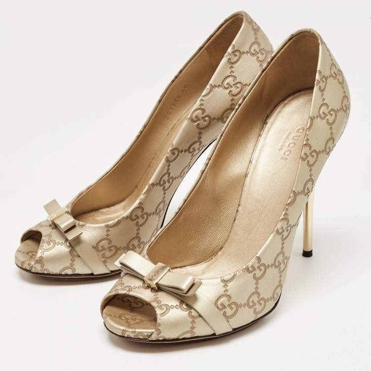 مملوكة مسبقًا Gucci Gold Guccissima Leather Bow Detail Peep Toe Pumps Size 40
