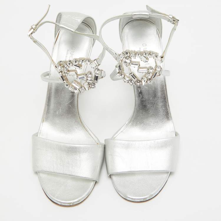 Pre Owned Gucci Silver Leather Crystal Embellished GG Logo Ankle Strap Sandals Size 37.5