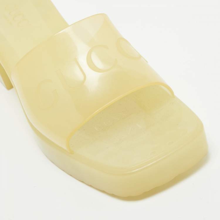Pre Owned Gucci Light Yellow Rubber Logo Embossed Slide Sandals Size 37
