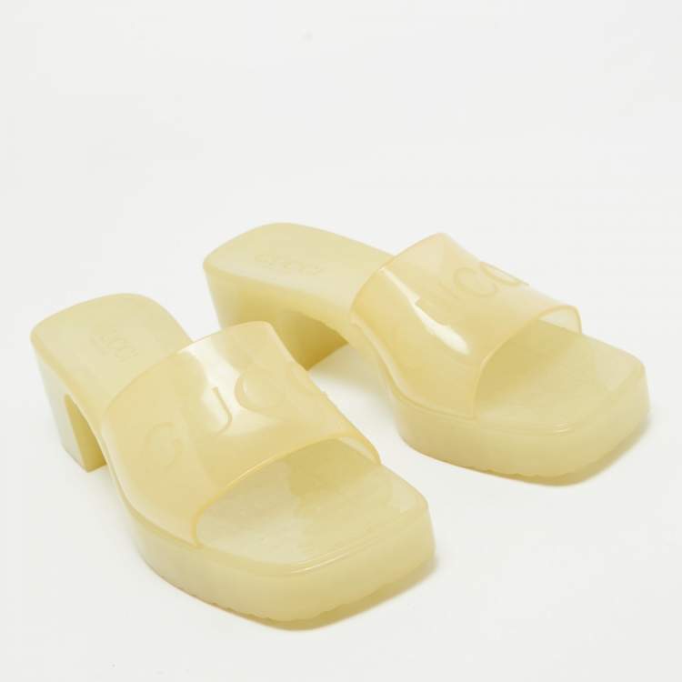 Pre Owned Gucci Light Yellow Rubber Logo Embossed Slide Sandals Size 37