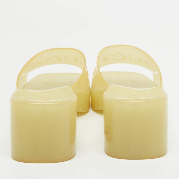 Pre Owned Gucci Light Yellow Rubber Logo Embossed Slide Sandals Size 37