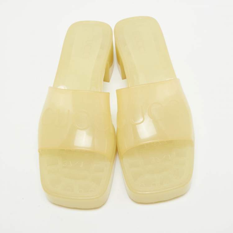 Pre Owned Gucci Light Yellow Rubber Logo Embossed Slide Sandals Size 37