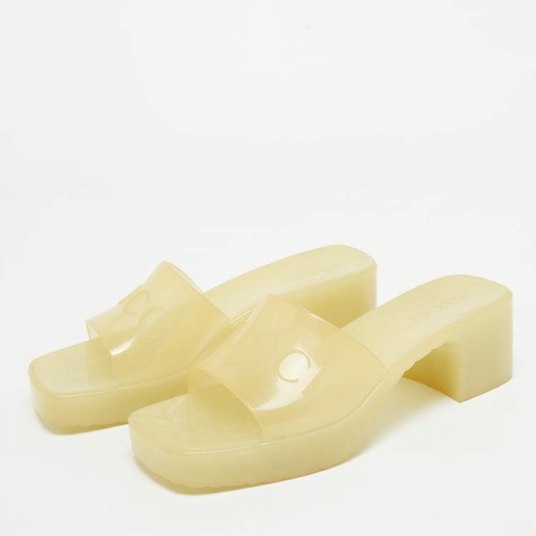 Pre Owned Gucci Light Yellow Rubber Logo Embossed Slide Sandals Size 37