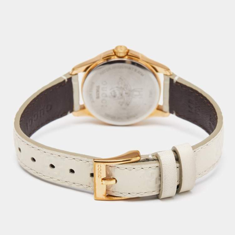 Pre Owned Gucci Cream Gold Plated Stainless Steel Leather G-Timeless 126.5 Women's Wristwatch 27 mm