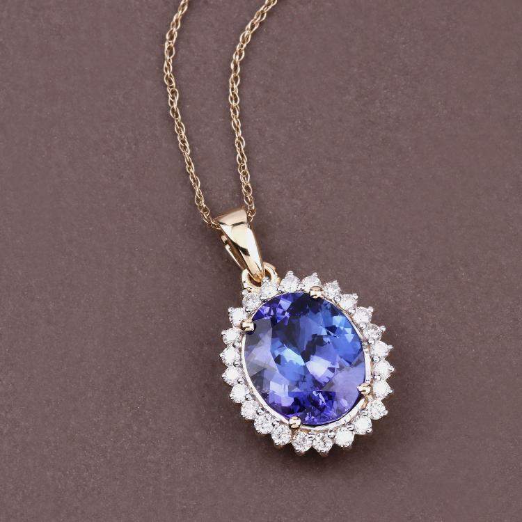 Pre Owned 4.34 cts Tanzanite and Diamond 14K Yellow Gold Halo Pendant