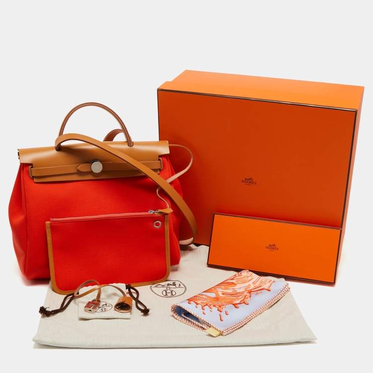 Pre Owned Hermes Orange Poppy/Natural Canvas and Leather Herbag Zip 31 Bag